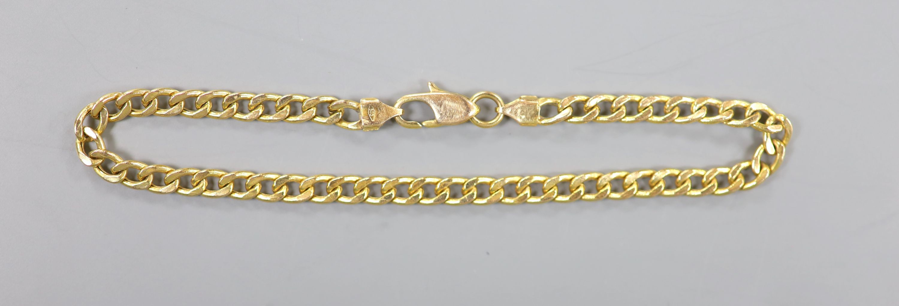 A modern 585 yellow metal curb link bracelet, 18cm, 3.3 grams.